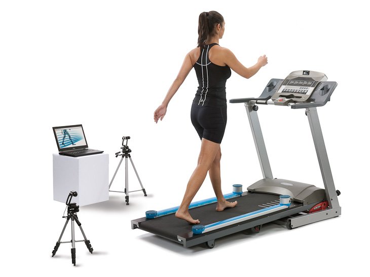 OptoGait installé sur les rails latéraux d'un tapis de course pour l'analyse de la marche